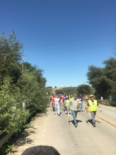 volunteers are cleaning the road